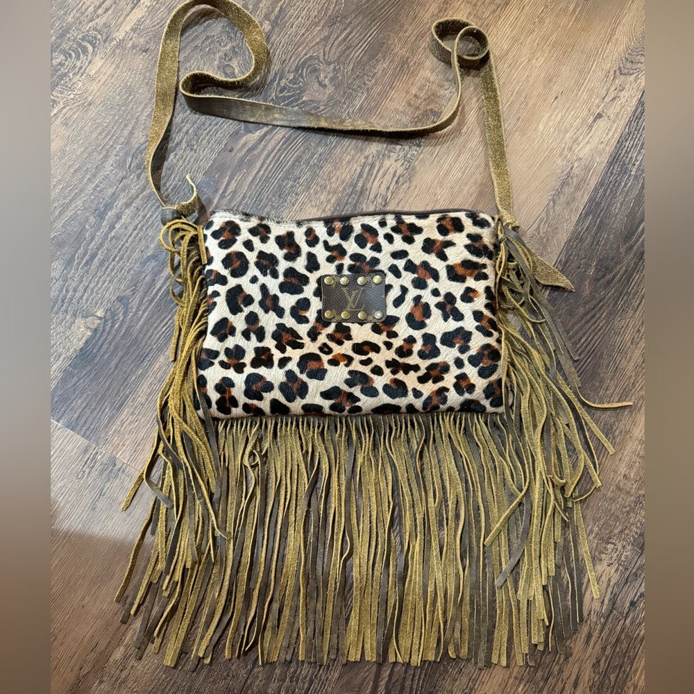 Cheetah print Louis Vuitton bag
